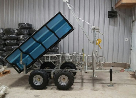 Walking Beam Logging Trailer with Crane Kit & Removable Box in lifted position, showcasing its 650 lb dumping capacity and durable galvanized frame.