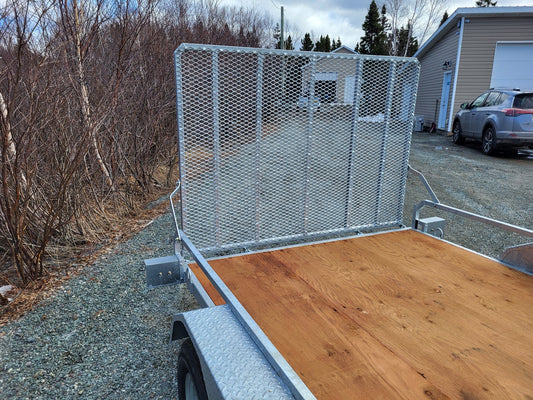 Rear gate detail of the Galvanized Double Axle Trailer with Side Ramp highlighting durable mesh ramp.