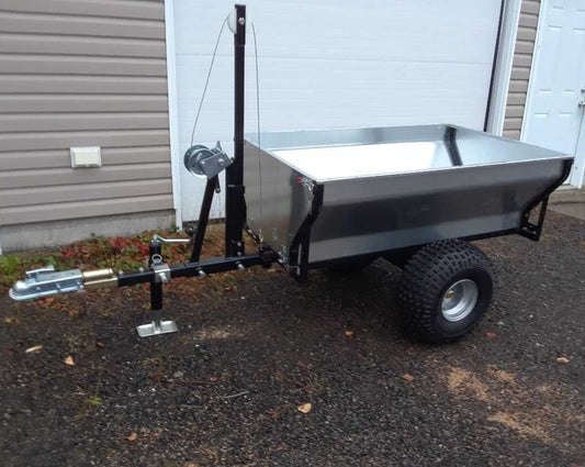 Single Axle Dump Trailer with Hand Winch in resting position, featuring a durable steel frame, large off-road tires, and a manual winch for easy dumping.