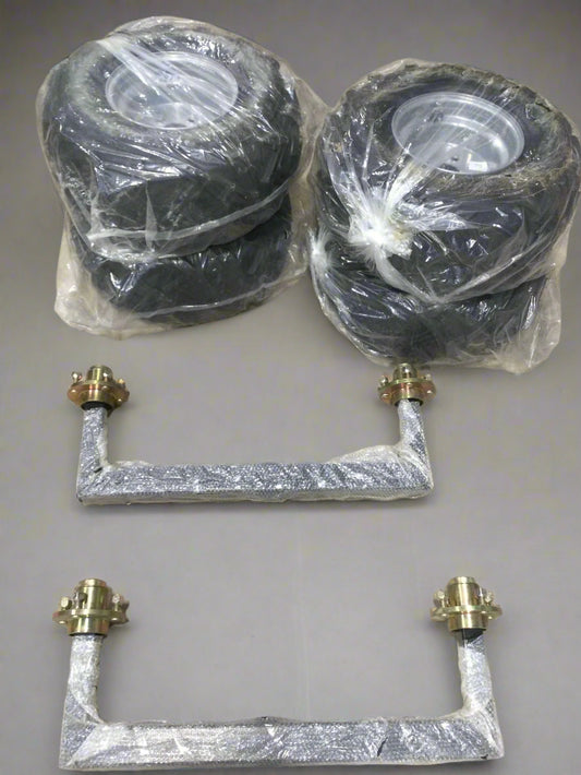 Complete Trailer Kit showing wrapped tires with rims and two wrapped axles with hubs.