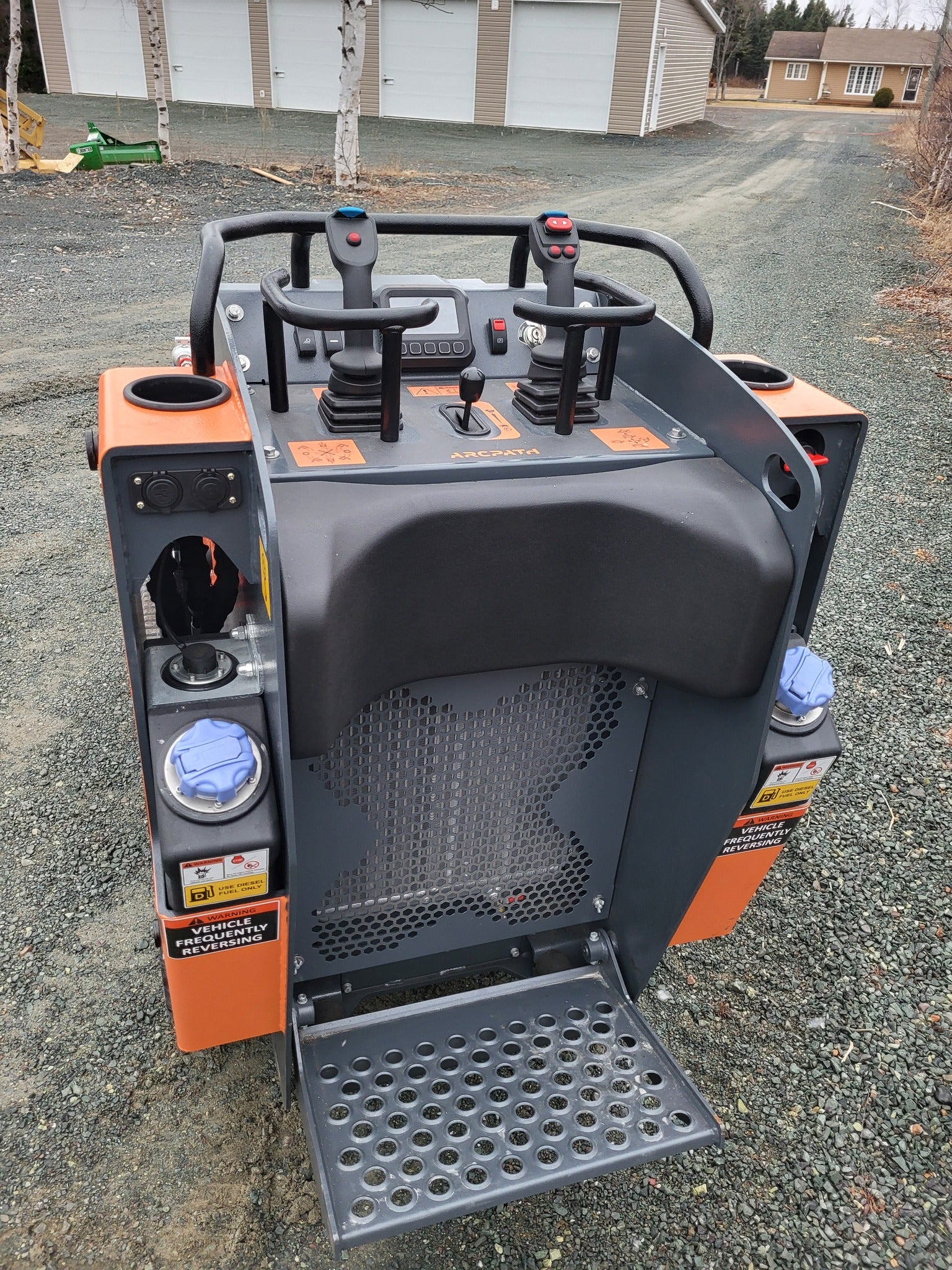 Operator control panel and joystick system on the ATL 1000 Mini Track Loader.